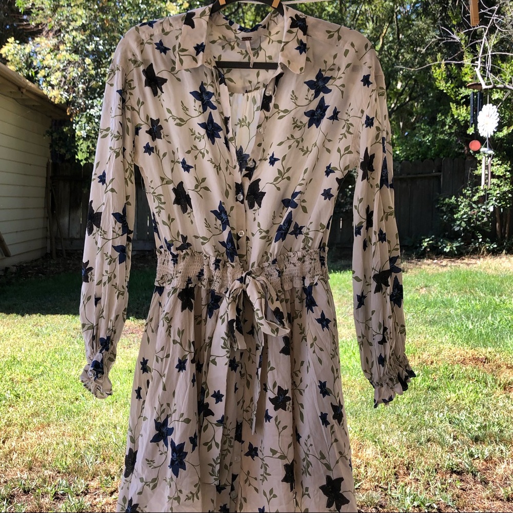 Mid-length, Free People dress with sinch waist